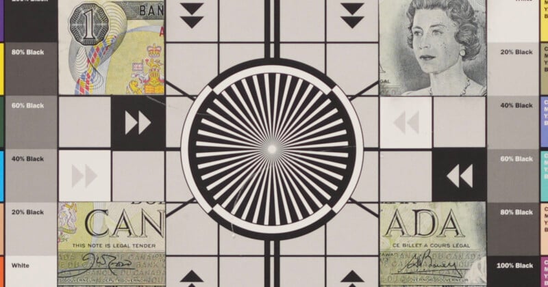 A test pattern chart featuring a central black and white radial design, grayscale percentage bars, and partial images of currency including a portrait and the word "CANADA" visible in the corners.
