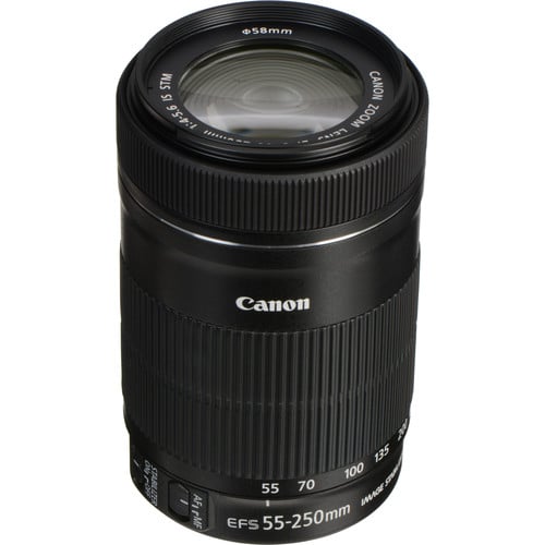 A black Canon EF-S 55-250mm camera lens with image stabilizer, featuring focal length markings and a textured grip, shown upright against a white background.