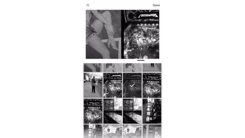 A phone screen displays a photo selection gallery in black and white, showing several images including artwork, pinball machines, a person standing outside, and cityscapes. One pinball machine photo is selected.