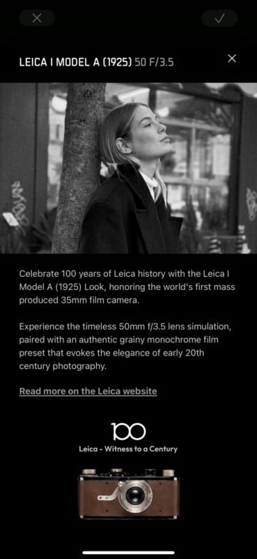 Black and white image of a woman in a coat, eyes closed and head tilted up, beside a tree. Below, text describes the Leica I Model A (1925) camera, celebrating 100 years with a photo and Leica’s logo.